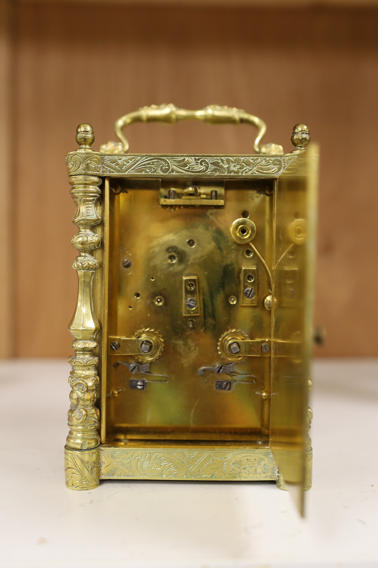 A repeating carriage clock by Auguste, Paris (missing bell), 13.5cm including handle. Condition - case and glass fair, untested if working